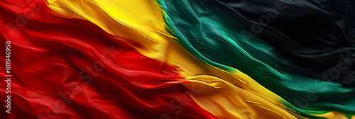Black History Month banner, vibrant textile texture, red yellow green and black paint flag color background. Juneteenth Freedom Day Celebration, african liberation day concept. photo