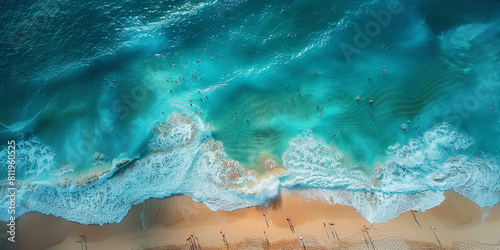 high aerial view image of sea coast with people on the  beach. Image with copyspace © Susana