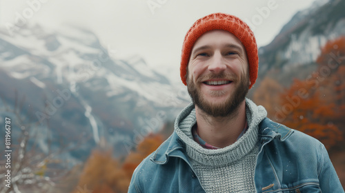 portrait of a guide for traveling in the mountains of America, 30 year caucasian man with smile on face in autumn natural park in the mountains