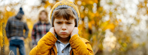 Family crisis, Unhappy little boy while his angry parents fighting, child feeling lonely during mom and dad's divorce, Stress and mental problems in childhood depressed, concept of childhood fears