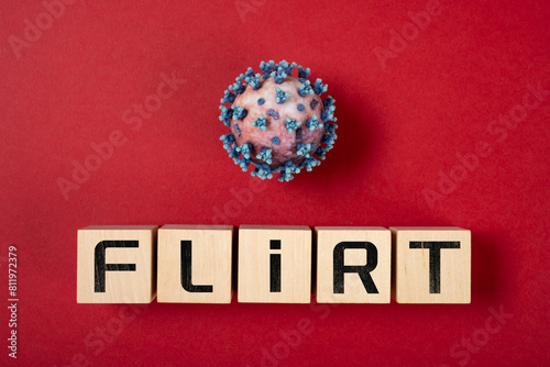 coronavirus and FLiRT variant on a red background © Freer