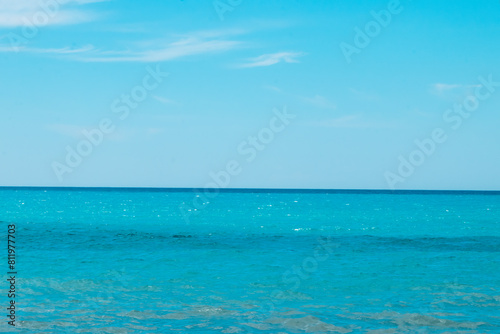 Blue sea with waves and sky. Ripples on blue water surface