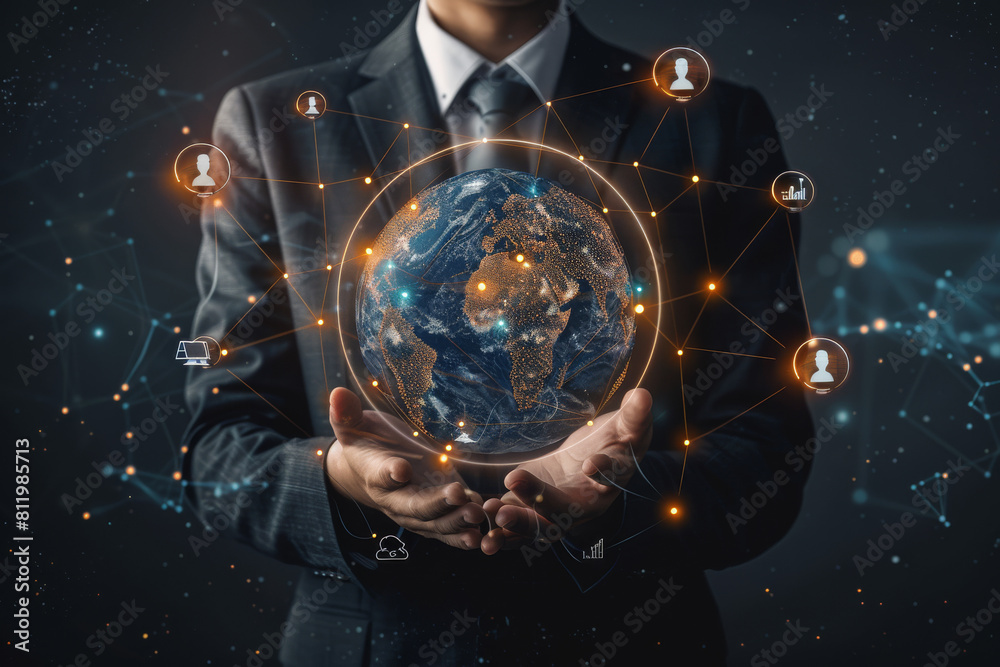 A man in a suit is holding a globe in his hands A man in a suit is holding a globe in his hands