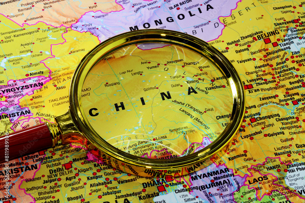 China map under magnifying glass, loupe. China on the World Map with regions and cities China map under magnifying glass, loupe. China on the World Map with regions and cities