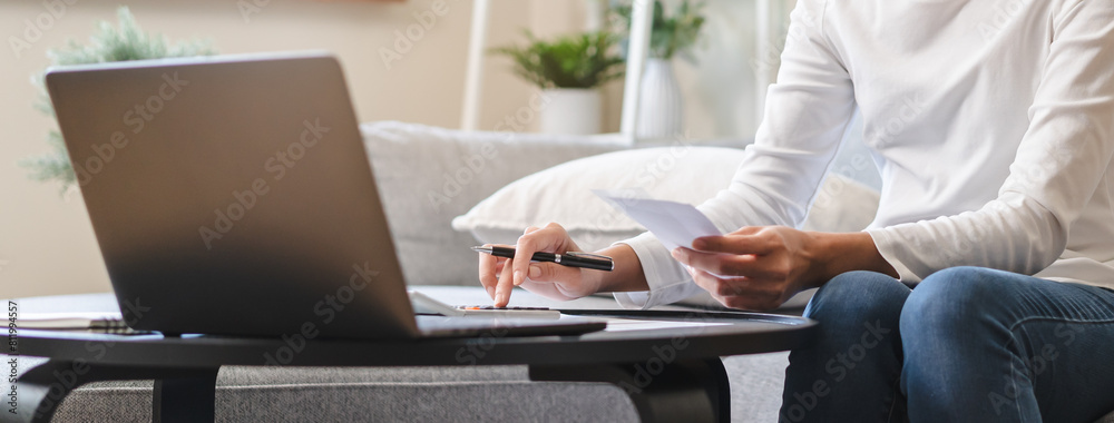 Women business people use calculators to calculate the company budget and income reports on the desk in the office. Women business people use calculators to calculate the company budget and income reports on the desk in the office.