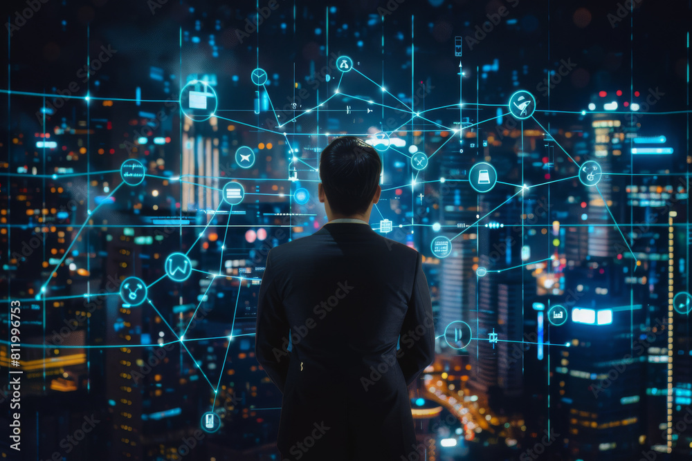 A man in a suit looking at a screen with icons on it A man in a suit looking at a screen with icons on it