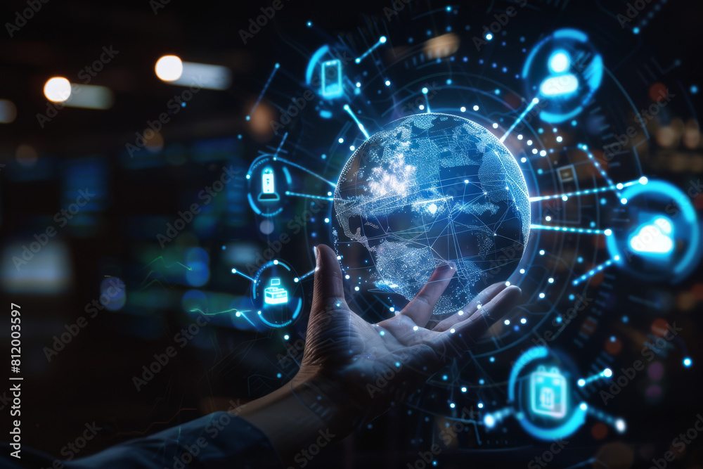 A hand is holding a glowing globe with icons around it A hand is holding a glowing globe with icons around it