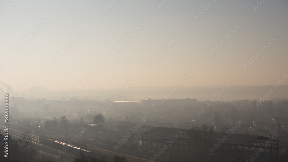 foggy day, top view of the village and the railway foggy day, top view of the village and the railway