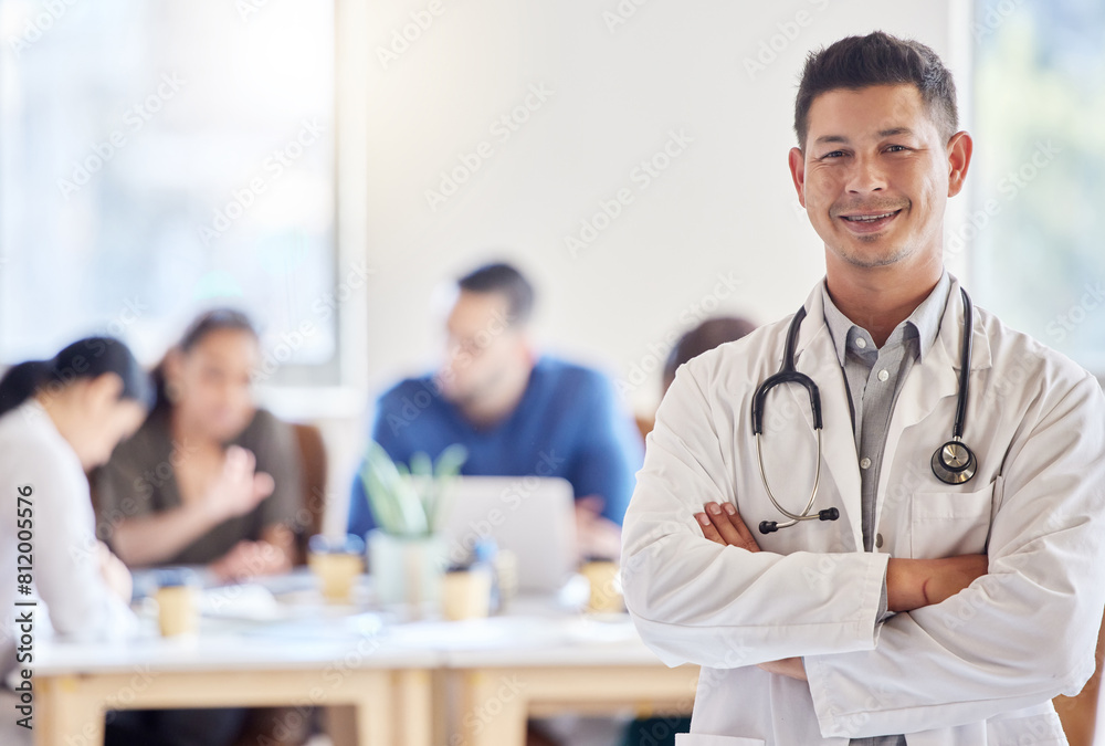 Fototapeta premium Portrait, smile and male doctor or leader in meeting, arms crossed and healthcare or planning. Hospital, happy and confidence for medical professional, clinic and manager for medicine wellness