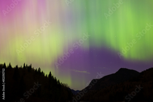 Colourful rainbow palette of beautiful aurora borealis in the Jacques-Cartier National Park  Stoneham-and-Tewksbury  Quebec  Canada