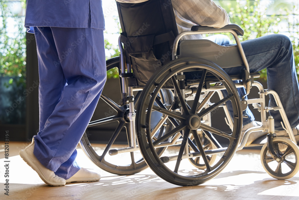 Obraz premium Push, nurse or patient in wheelchair in hospital for healthcare service, helping others or clinic support. Closeup, people or person with disability or medical care for rehabilitation or recovery