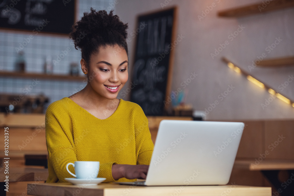 Afro American girl in cafe