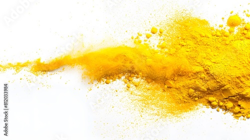 Yellow powder gently spread on a white background, radiating cheerfulness and positivity. photo