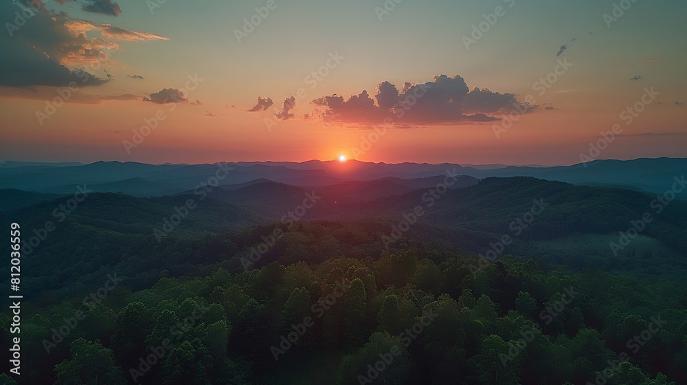 Sunset Over Lush Green Mountain Range
