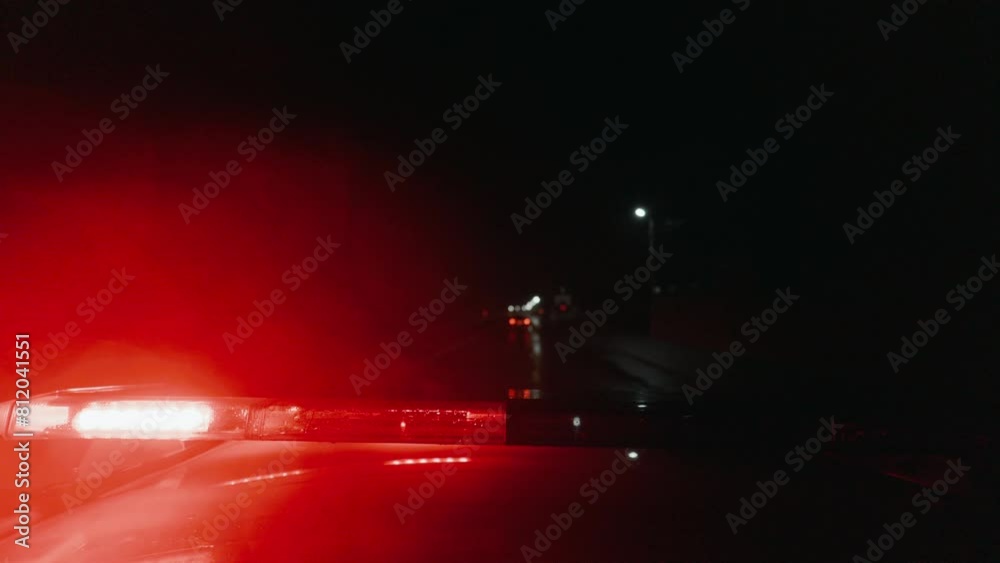 Police car in hot pursuit down the highway as a suspect attempts to evade capture. The adrenaline-filled chase unfolds as the car races away from law enforcement