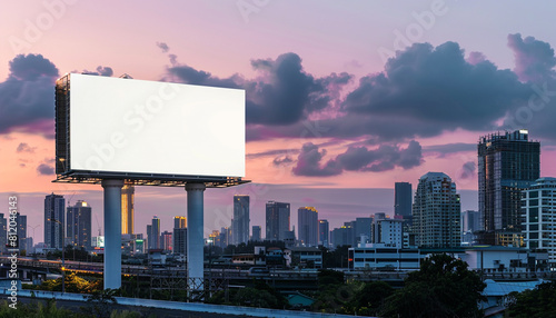 Seamless transition from day to night on a white billboard for high-quality urban advertising, city skyline in the background.