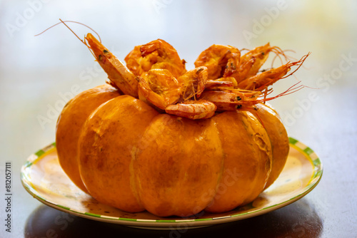 Traditional shrimp bobó in moranga pumpkin photo