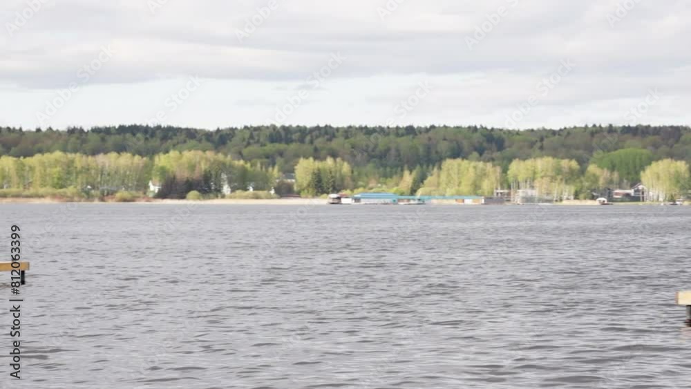 view from the jetty in summer on the big river view from the jetty in summer on the big river