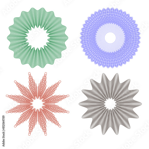 A set of four multi-colored guilloche