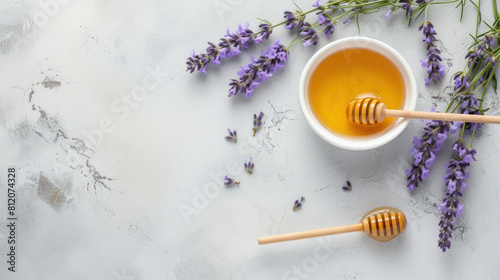 Honey in the bowl wooden spoon © Neha