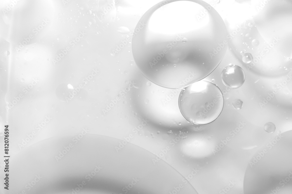 Clear oil on the surface of the water. Clear oil on the surface of the water.