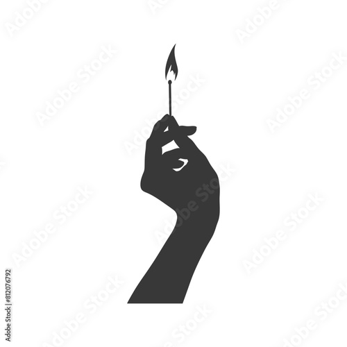 Silhouette hand holding burning match black color only