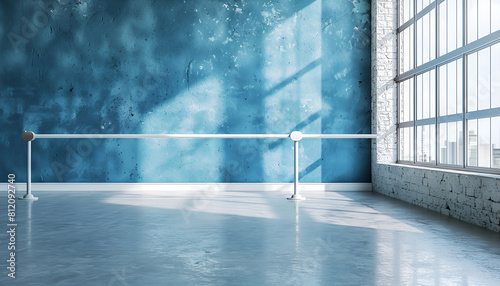 ballet barre in a room with a distressed blue wall  set on a gloss floor  evoking a minimalist aesthetic