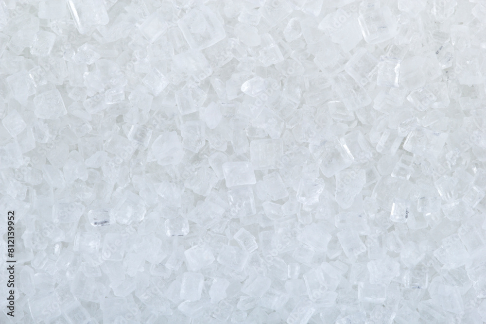 White sugar crystals texture background, close up shot White sugar crystals texture background, close up shot