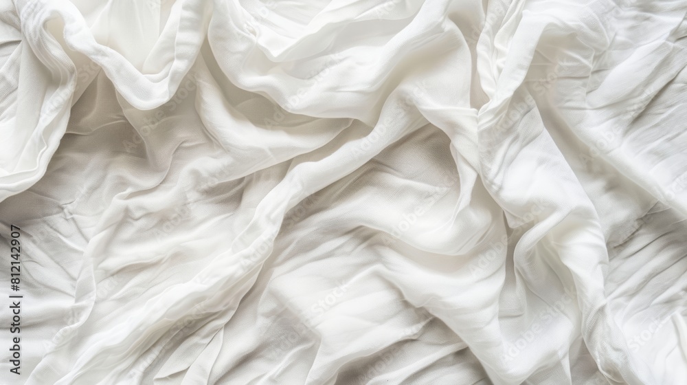 White crumpled fabric, wrinkled cotton texture, close-up.