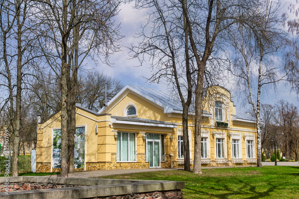 Bright spring in Gomel park. Sun, flowers, alleys in flower beds in a city park.