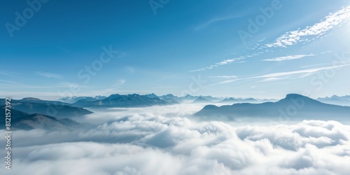Amazing view above the clouds to the mountain range