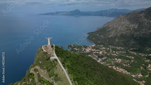 Aerial shot of Christ the Redeemer of Maratea overlooking the cliff,
Italy Basilicata
