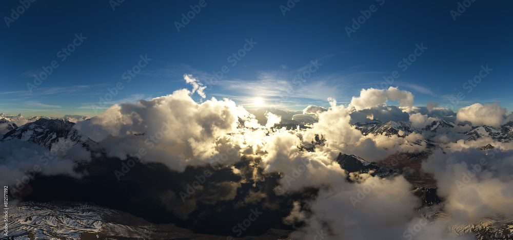 Dramatic Aerial Panorama of Clouds and Mountain Landscape. Nature Background. Dramatic Aerial Panorama of Clouds and Mountain Landscape. Nature Background.