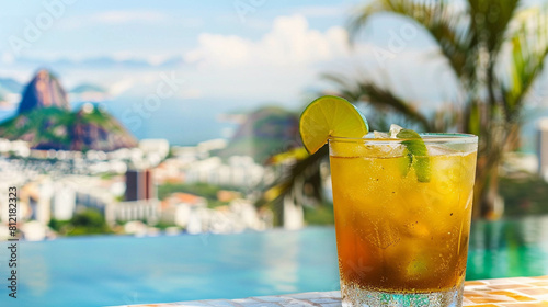 A refreshing drink with Rio de Janeiro in the background. Summer vibes in Brazil. Vacations in South America