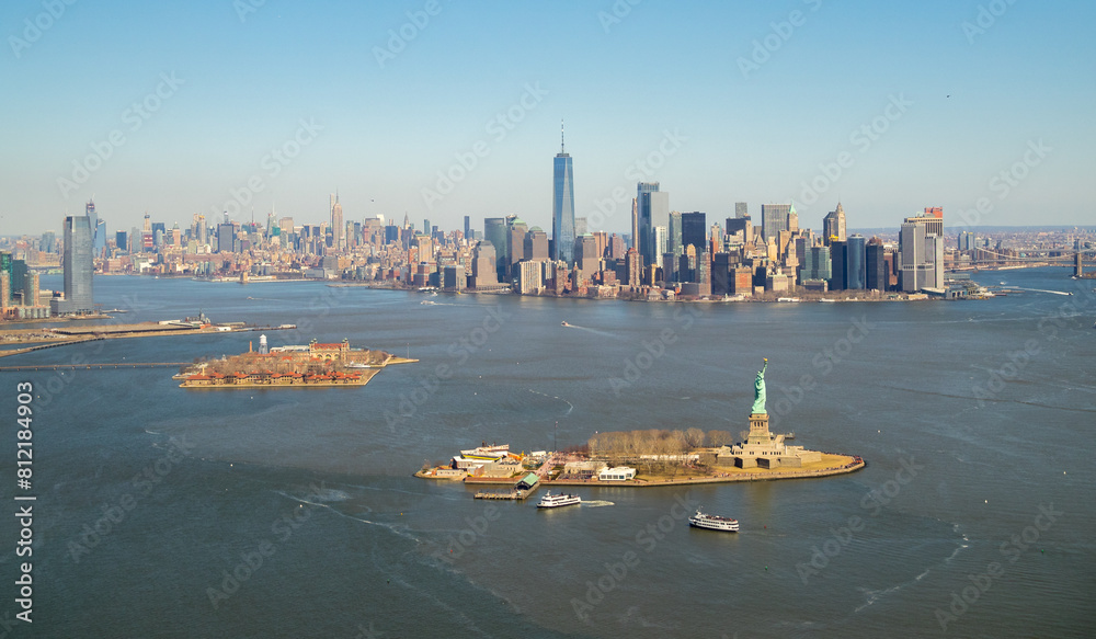 Liberty and Ellis Islands and downtown Manhattan seen from an helicopter ride over New York Bay