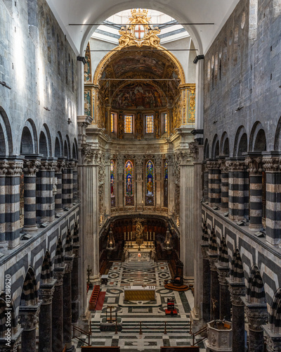 Grand interior of Genova Cathedral with high vaulted ceiling, Liguria, Italy