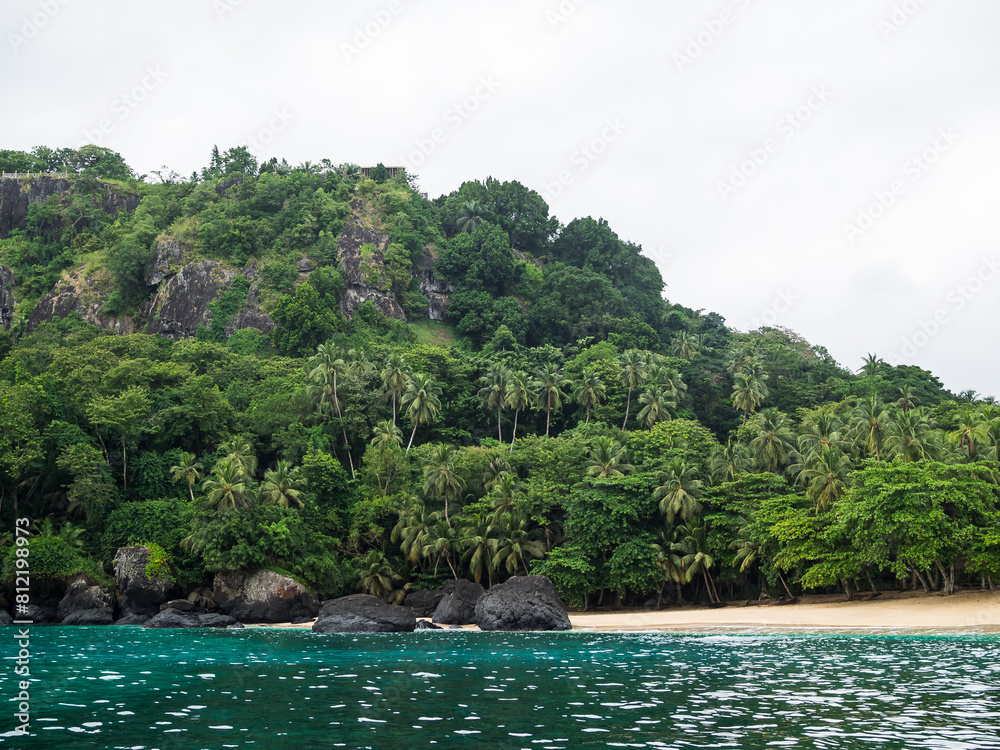 Tropical forest and white sand beach off Principe Island Tropical forest and white sand beach off Principe Island