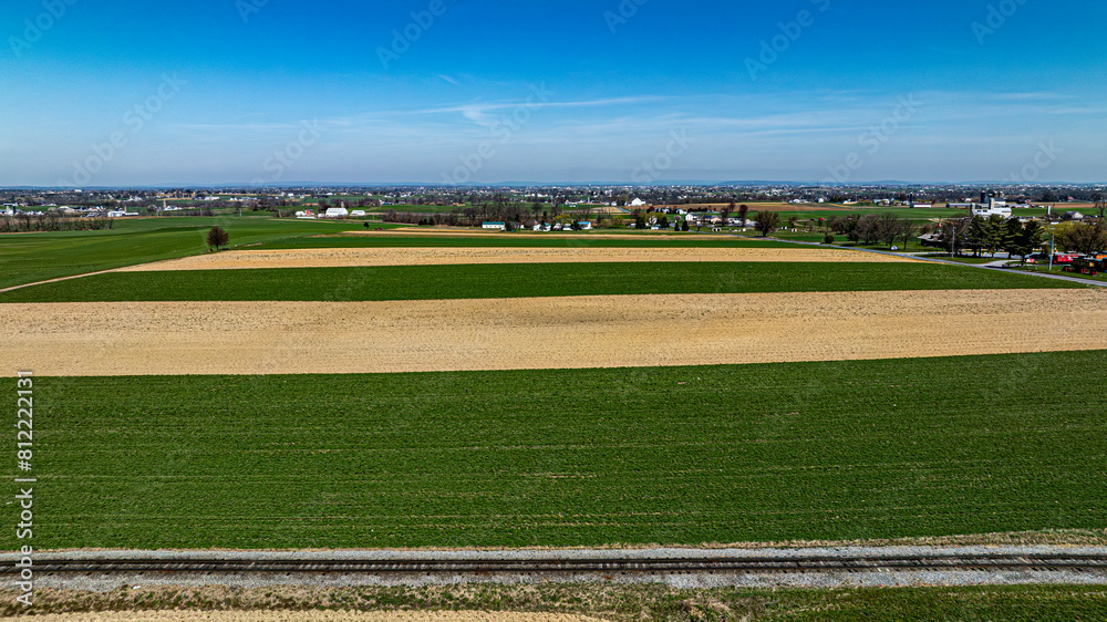 Aerial View of Patchwork Farmland and Village