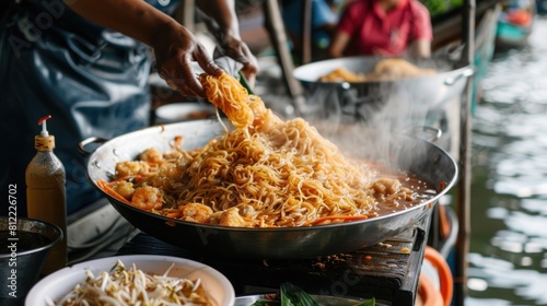 noodle food making on floating boat in floating market photo