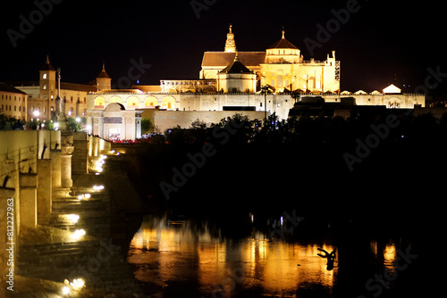 the roman bridge and the mezquina on a magina night in cordoba 
