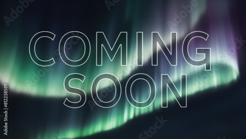 Aurora Borealis in clear night sky, with bold announcement “COMING SOON”