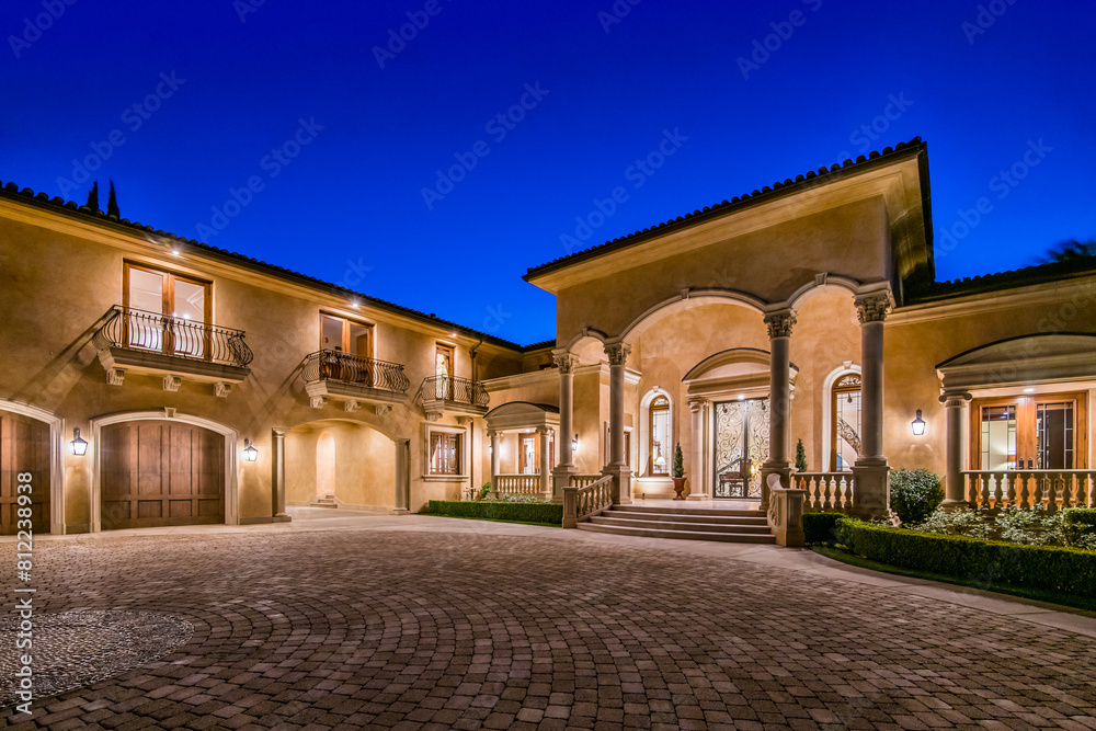 Fototapeta premium Large Brick Driveway Leading to a Large House