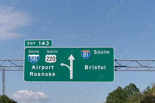 Sign on Interstate 81 South towards Bristol, Virginia/Tennessee for exit 143 for I-581 South and US-220 South toward Roanoke and the Roanoke-Blacksburg Regional Airport photo