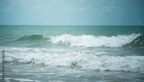 pale blue sea wave during high summer tide abstract ocean background