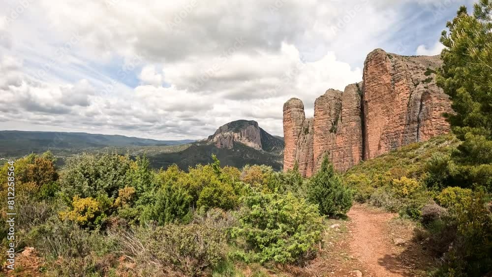 a view of Mallos de Riglos rock formations, comarca of Hoya de Huesca, province of Huesca, Aragon, Spain a view of Mallos de Riglos rock formations, comarca of Hoya de Huesca, province of Huesca, Aragon, Spain