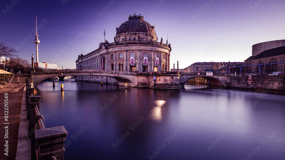 Fototapeta premium Bode Museum at Sunset, Reflective Spree River View, Berlin's Iconic Cityscape