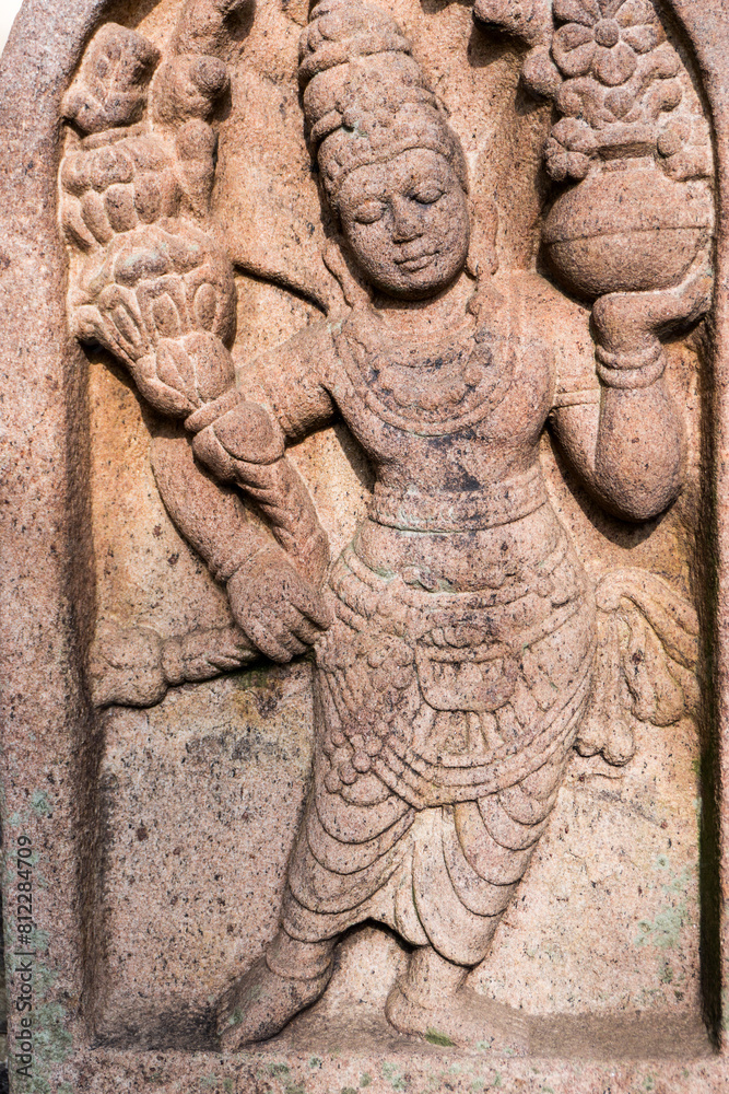 Sri-Lanka rock art of bas relief sculptures of God, Animals carved in the monolithic rock Sri-Lanka rock art of bas relief sculptures of God, Animals carved in the monolithic rock