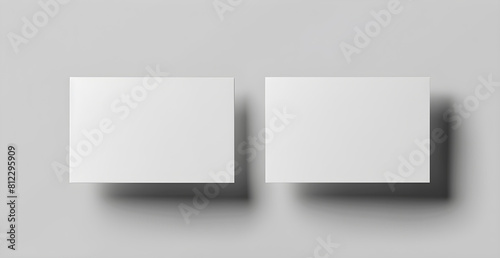 Two white cards with nothing on them photo