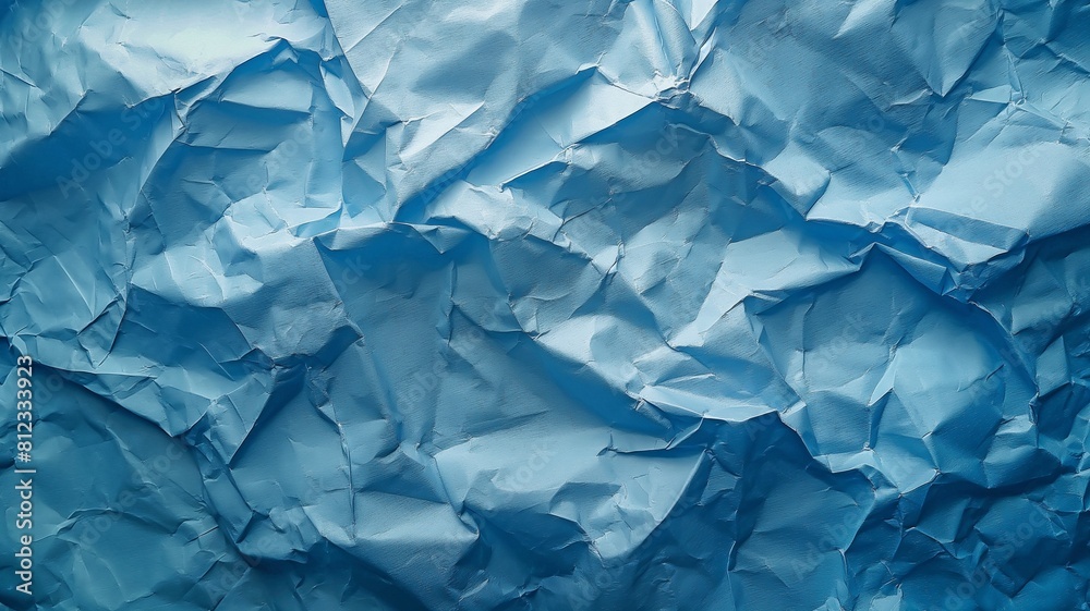 Light blue background with a crumpled paper texture Light blue background with a crumpled paper texture