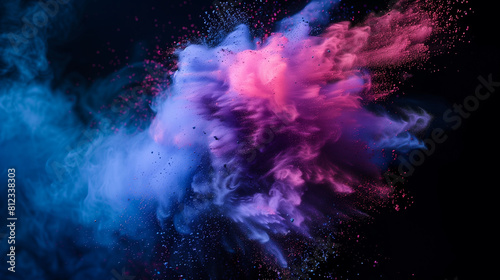 Close-up of colorful powder particles suspended in mid-air photo